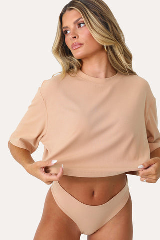 Model wearing the Brown Sugar basics crop shirt