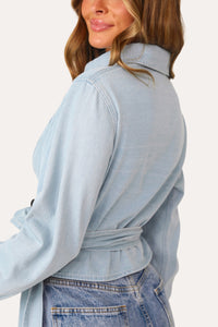 Model wearing 'Pamela' Denim Wrap Top.
