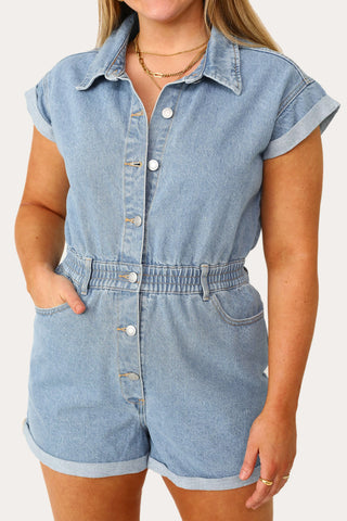 Model wearing the American Woman Denim romper.