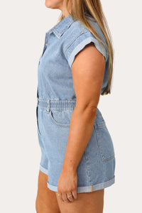 Model wearing the American Woman Denim romper.