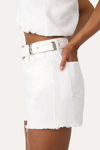 Model wearing the Born Free White belted Denim shorts.