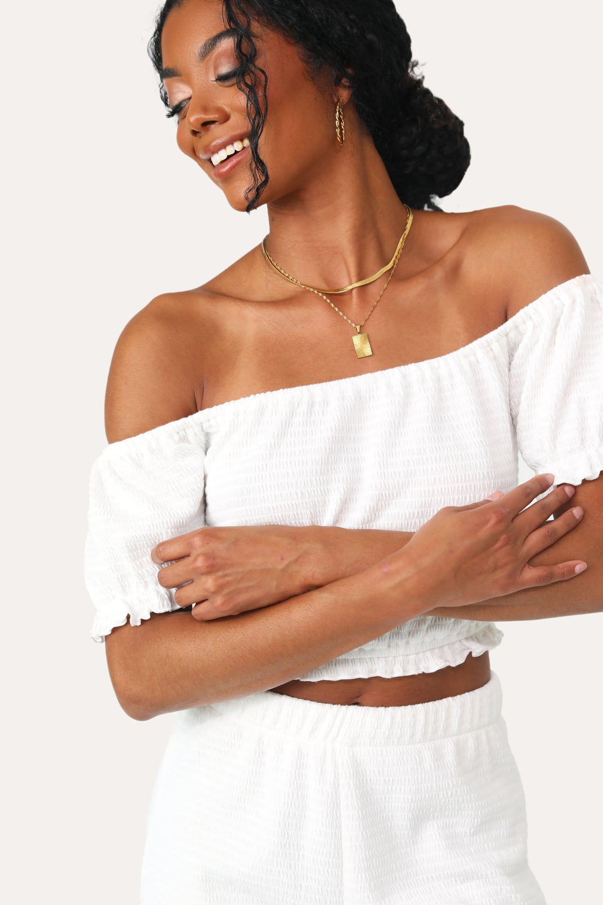 Model wearing the American Dream White Smocked top.