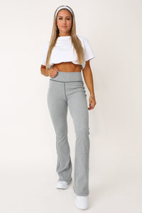 Model wearing the Rookie Crop Shirt with bungees.