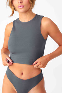 Model wearing Charcoal Full Coverage Rib Bra Tank, stretchy rib knit seamless fabrication, with high scoop neckline and back.
