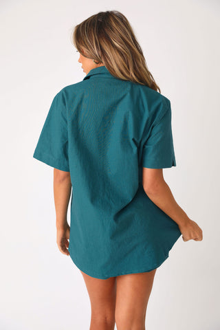 Back view of model wearing the Cool Breeze Linen shirt.  