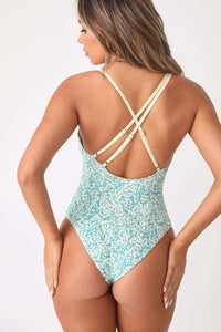 Close up back view model wearing the Dive Deep one piece.