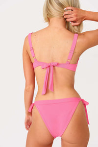 Close up back view of model wearing the Miley Underwire top with the Mimi tie bikini bottoms.