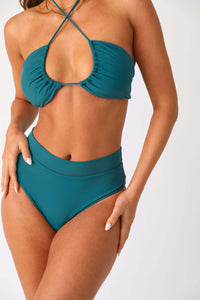 Close up front view of model wearing the Tansie Bikini bottom paired with the Tansie bikini top.
