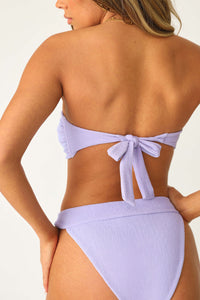 Model wearing the Ariel Bikini bottom and matching top.