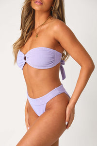 Model wearing the Ariel Bikini bottom and matching top.