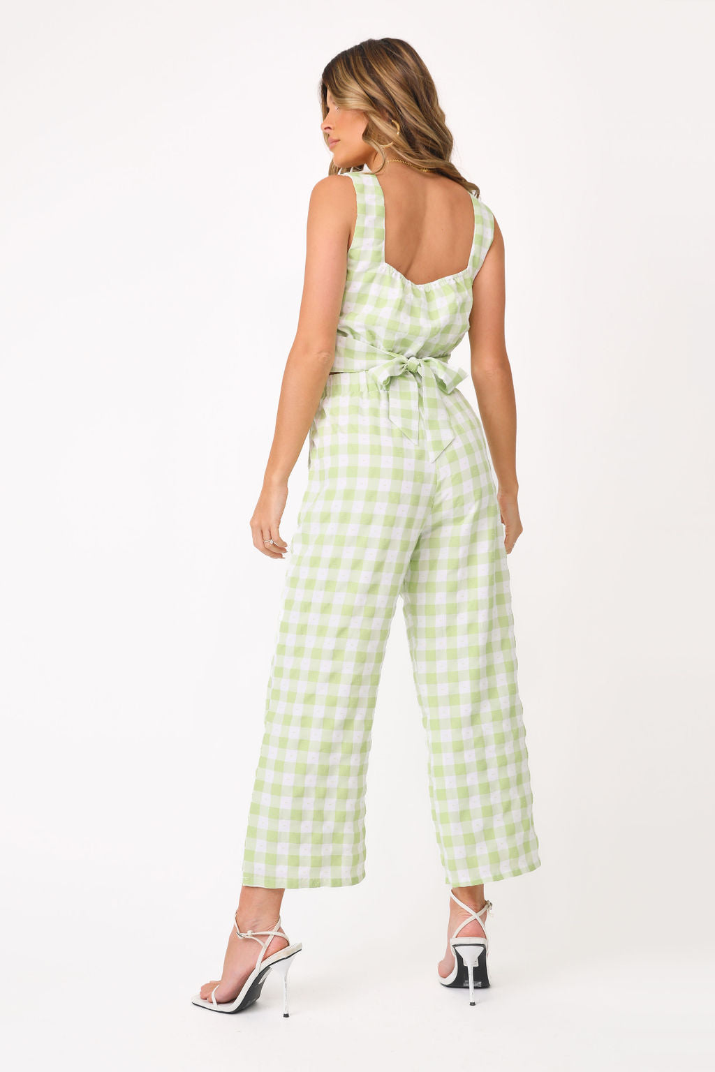 Back view of model wearing the Chloe Gingham Pant with matching top.
