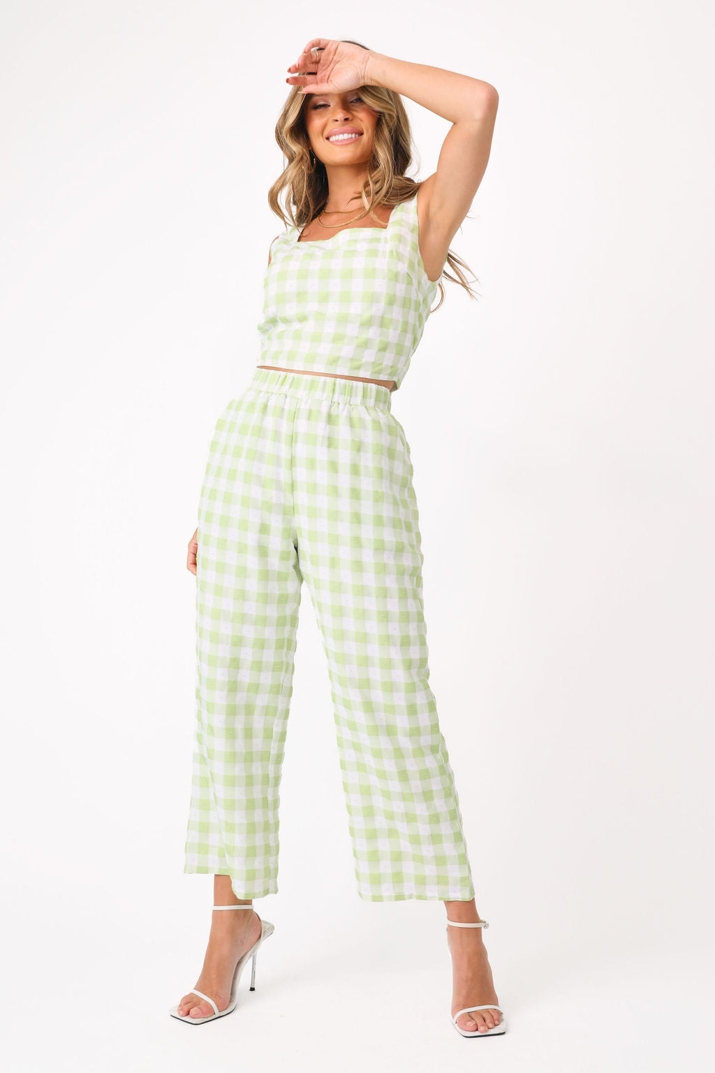 Front view of model wearing Chloe Gingham top.